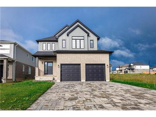 128 Basil Crescent, Ilderton, ON - Outdoor With Facade