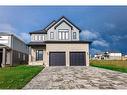 128 Basil Crescent, Ilderton, ON  - Outdoor With Facade 