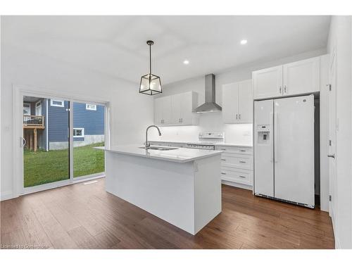 128 Basil Crescent, Ilderton, ON - Indoor Photo Showing Kitchen