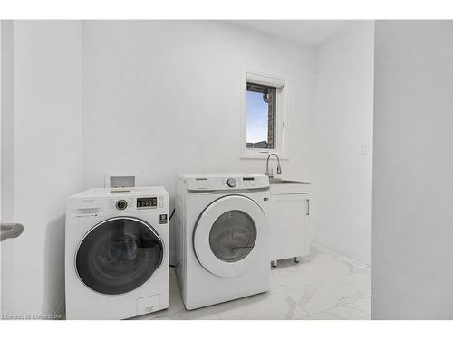 128 Basil Crescent, Ilderton, ON - Indoor Photo Showing Laundry Room