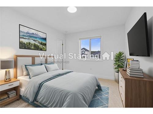 128 Basil Crescent, Ilderton, ON - Indoor Photo Showing Bedroom