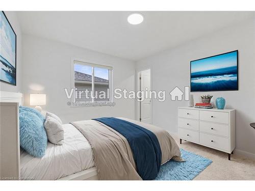 128 Basil Crescent, Ilderton, ON - Indoor Photo Showing Bedroom