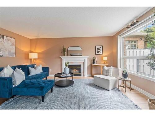 112 Stone Church Road W, Hamilton, ON - Indoor Photo Showing Living Room With Fireplace