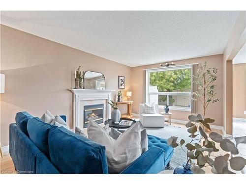 112 Stone Church Road W, Hamilton, ON - Indoor Photo Showing Living Room With Fireplace