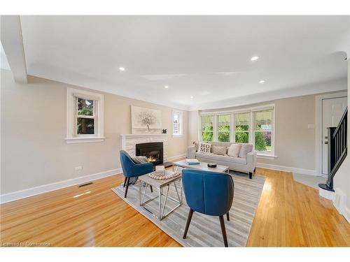 55 East 13Th Street, Hamilton, ON - Indoor Photo Showing Living Room With Fireplace