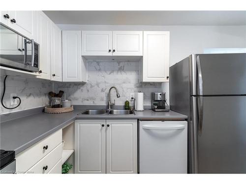 239 East 22Nd Street, Hamilton, ON - Indoor Photo Showing Kitchen With Double Sink