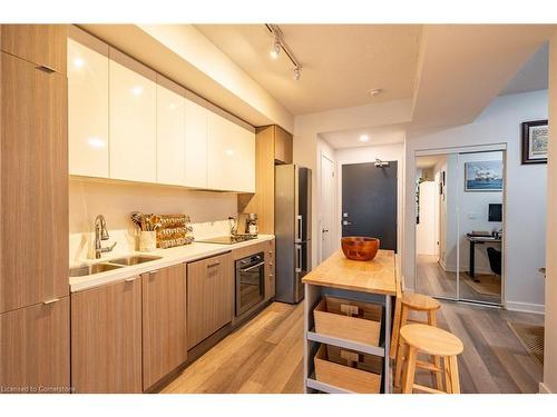 A428-5230 Dundas Street, Burlington, ON - Indoor Photo Showing Kitchen With Double Sink