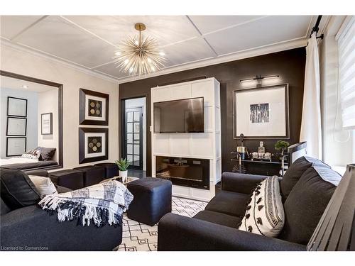 301-69 Herkimer Street, Hamilton, ON - Indoor Photo Showing Living Room With Fireplace