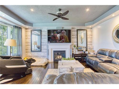 261 Montreal Circle, Stoney Creek, ON - Indoor Photo Showing Living Room With Fireplace