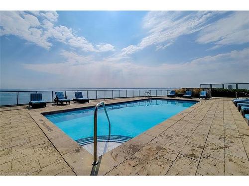 323-11 Bronte Road, Oakville, ON - Outdoor With In Ground Pool