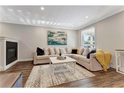 82 East 35Th Street, Hamilton, ON - Indoor Photo Showing Living Room With Fireplace