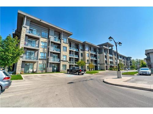 404-35 Southshore Crescent, Stoney Creek, ON - Outdoor With Balcony With Facade