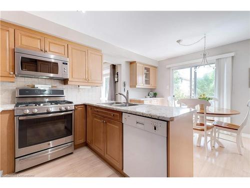 3200 Tania Crescent, Burlington, ON - Indoor Photo Showing Kitchen With Double Sink