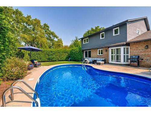 4235 Spruce Avenue, Burlington, ON - Outdoor With In Ground Pool With Deck Patio Veranda With Backyard With Exterior