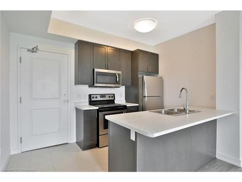 706-2486 Old Bronte Road, Oakville, ON - Indoor Photo Showing Kitchen With Double Sink