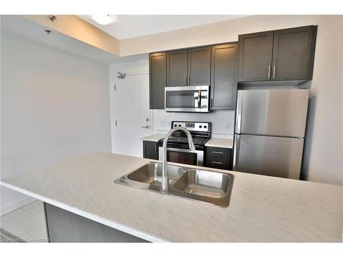 706-2486 Old Bronte Road, Oakville, ON - Indoor Photo Showing Kitchen With Double Sink