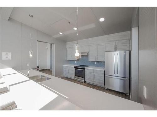 1208-2081 Fairview Street, Burlington, ON - Indoor Photo Showing Kitchen With Stainless Steel Kitchen With Double Sink With Upgraded Kitchen