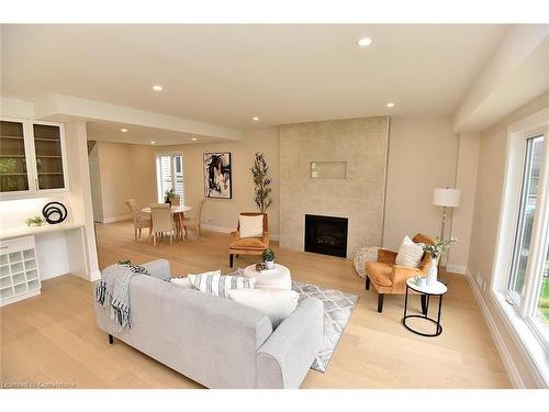 20 Clare Avenue, Hamilton, ON - Indoor Photo Showing Living Room With Fireplace