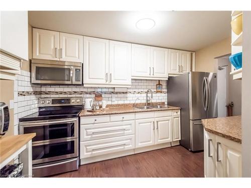 105-6 Niagara Street, Grimsby, ON - Indoor Photo Showing Kitchen With Double Sink