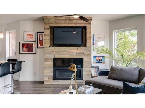 3-12 West Avenue N, Hamilton, ON - Indoor Photo Showing Living Room With Fireplace