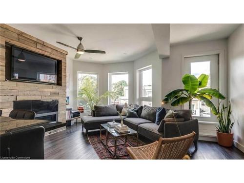 3-12 West Avenue N, Hamilton, ON - Indoor Photo Showing Living Room With Fireplace