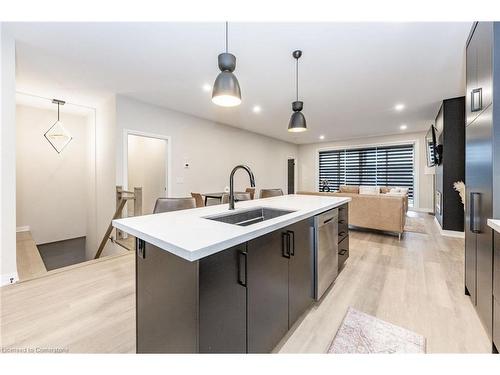 22-300 Richmond Street, Thorold, ON - Indoor Photo Showing Kitchen With Double Sink