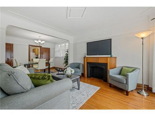 24 Thorndale Street N, Hamilton, ON - Indoor Photo Showing Living Room With Fireplace