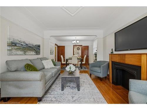 24 Thorndale Street N, Hamilton, ON - Indoor Photo Showing Living Room With Fireplace