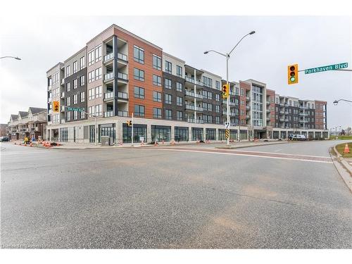 320-150 Oak Park Boulevard, Oakville, ON - Outdoor With Balcony With Facade