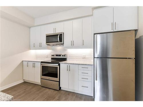 320-150 Oak Park Boulevard, Oakville, ON - Indoor Photo Showing Kitchen With Stainless Steel Kitchen