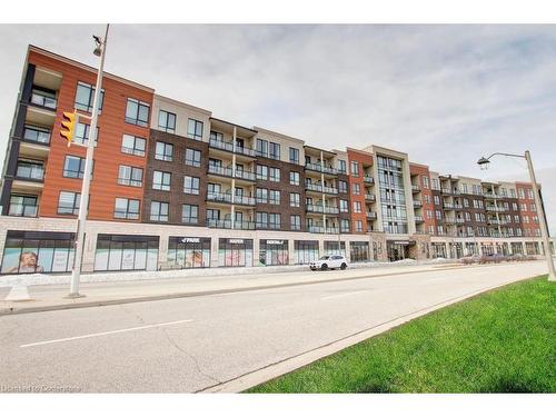 320-150 Oak Park Boulevard, Oakville, ON - Outdoor With Balcony With Facade