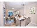 347-16 Concord Place, Grimsby, ON  - Indoor Photo Showing Kitchen With Double Sink 