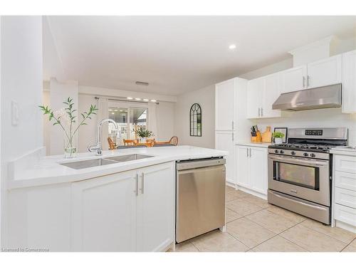 96 Stoneglen Way, Mount Hope, ON - Indoor Photo Showing Kitchen With Double Sink