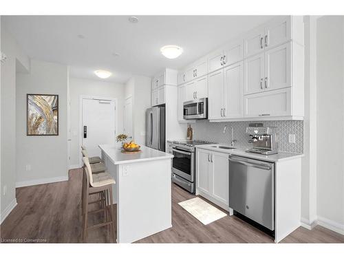 109-95 Dundas Street W, Oakville, ON - Indoor Photo Showing Kitchen With Stainless Steel Kitchen