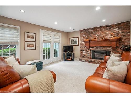 1926 Kerns Road, Burlington, ON - Indoor Photo Showing Living Room With Fireplace