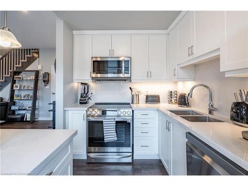 61-383 Dundas Street E, Waterdown, ON - Indoor Photo Showing Kitchen With Double Sink