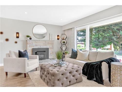 20 Geneva Drive, Hamilton, ON - Indoor Photo Showing Living Room With Fireplace