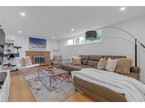 20 Geneva Drive, Hamilton, ON - Indoor Photo Showing Living Room With Fireplace