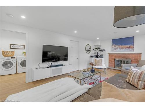 20 Geneva Drive, Hamilton, ON - Indoor Photo Showing Living Room With Fireplace