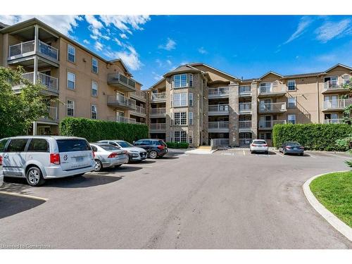 101-1450 Bishops Gate, Oakville, ON - Outdoor With Balcony With Facade