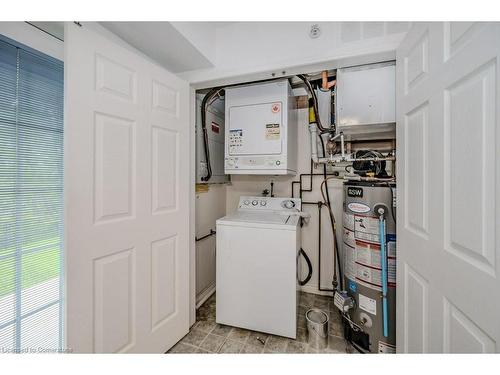 101-1450 Bishops Gate, Oakville, ON - Indoor Photo Showing Laundry Room