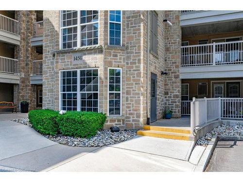 101-1450 Bishops Gate, Oakville, ON - Outdoor With Balcony With Facade