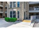 101-1450 Bishops Gate, Oakville, ON  - Outdoor With Balcony With Facade 