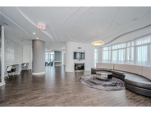 3004-60 Absolute Avenue, Mississauga, ON - Indoor Photo Showing Living Room With Fireplace