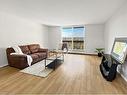 511-350 Quigley Road, Hamilton, ON  - Indoor Photo Showing Living Room 