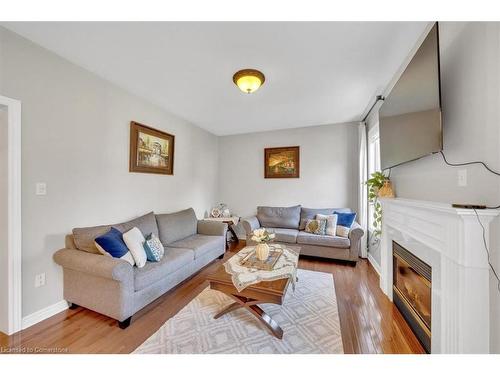 8 Hesham Drive, Whitby, ON - Indoor Photo Showing Living Room With Fireplace