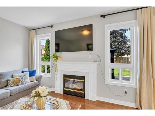 8 Hesham Drive, Whitby, ON - Indoor Photo Showing Living Room With Fireplace