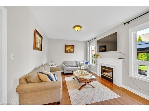 8 Hesham Drive, Whitby, ON - Indoor Photo Showing Living Room With Fireplace