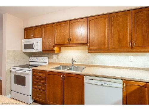 50 Grovetree Trail, Hamilton, ON - Indoor Photo Showing Kitchen With Double Sink