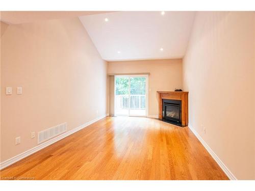 50 Grovetree Trail, Hamilton, ON - Indoor With Fireplace